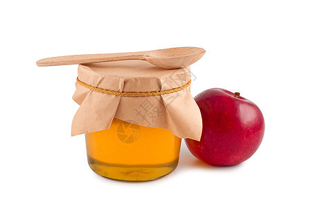 蜜糖在罐子木勺红苹果分离贮存绳索玻璃水果罐装产品食物黄色库存甜点图片