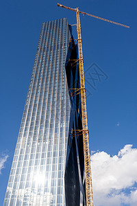 摩天大楼建筑工地上的起重机房子住宅财产建设者天空工程技术进步蓝色职业图片