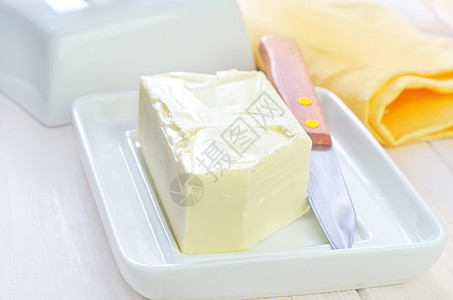 黄油持有者面团环境食品柔软度敷料橙子奶制品烹饪早餐图片