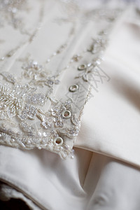 结婚详情婚礼白色裙子胸衣蕾丝衣服纺织品丝绸女士背景图片