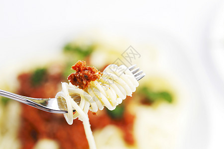 意大利面条和叉子牛肉草本植物美食糖类盘子食物香料蔬菜午餐餐厅图片