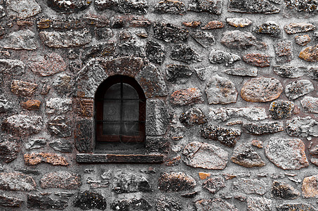 砖墙上的旧窗口建筑岩石建筑师石工建造古董历史警卫水泥建筑学图片