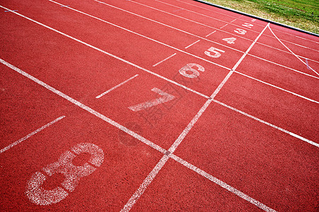赛道行道白色运动赛马场太阳红色竞争短跑体育场橡皮比赛图片