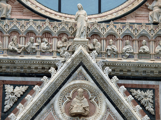 Duomo外墙的建筑细节锡耶纳大教堂耳堂艺术大理石首都教会宽慰圣母拱廊雕塑图片
