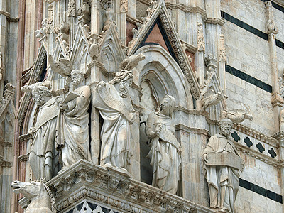 Duomo外墙的建筑细节锡耶纳门户网站艺术浮雕宽慰教会首都建筑学大教堂拱形大理石图片
