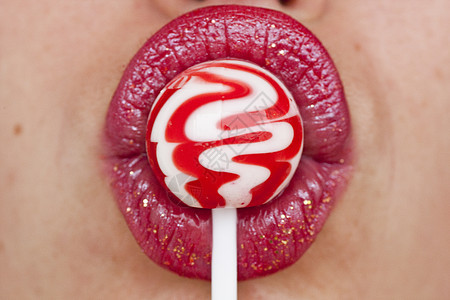 红嘴唇 有棒棒糖粉色乐趣女士女性食物红色圆形宏观图片