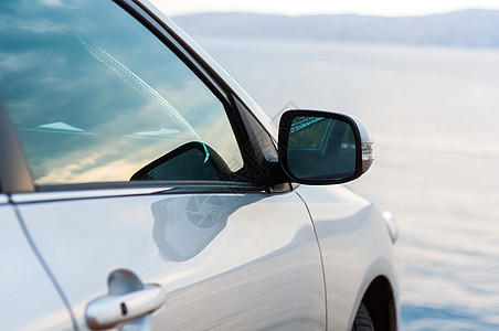汽车门把手户外汽车停车旅行镜子白色反射车辆玻璃蓝色运输发动机奢华背景