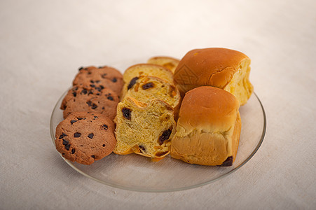 甜食面包和饼干的选择面包团体小吃早餐食物糕点脆皮桌子包子小麦图片