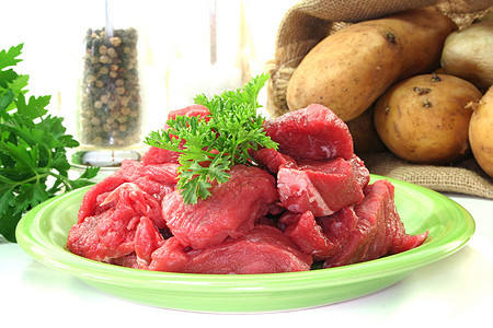 原 Stew 堆营养盘子食谱香料炖肉绿色香菜低脂肪土豆食物图片