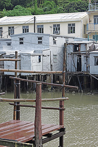 鱼越水著名的水上木屋风化窝棚建筑住宅城市木头天空钓鱼棚户区村庄背景