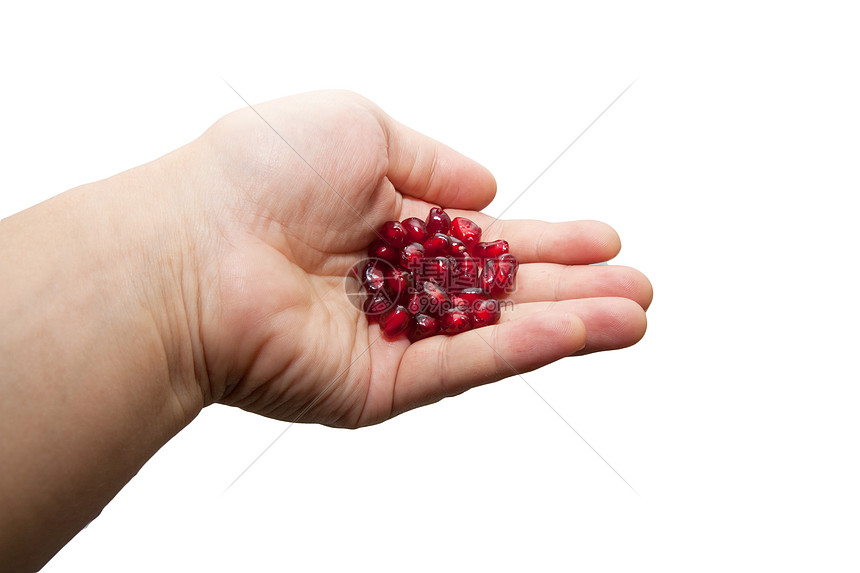 手里拿着红石榴情调热带浆果石榴种子白色水果粉色红色营养图片