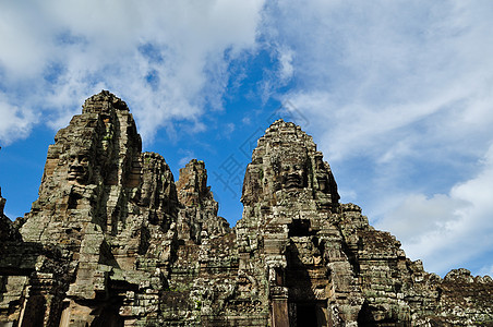 柬埔寨的Bayon寺庙考古学砂岩热带石头微笑佛教徒宗教艺术上帝天空图片