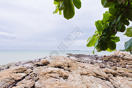 海边的落基海滩海洋石头旅行运动风景日落荒野场景海浪热带图片