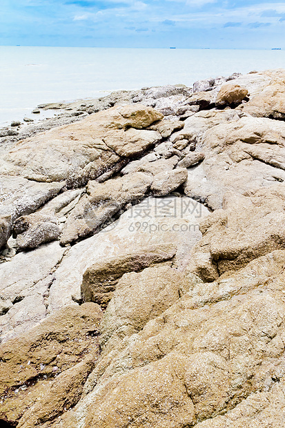 海滩 岩石地区和海洋野生动物天空场景运动地平线阳光日落太阳海岸旅行图片