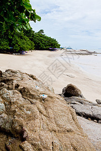 海滩 岩石地区和海洋蓝色野生动物场景风景荒野日落天空太阳热带海岸图片