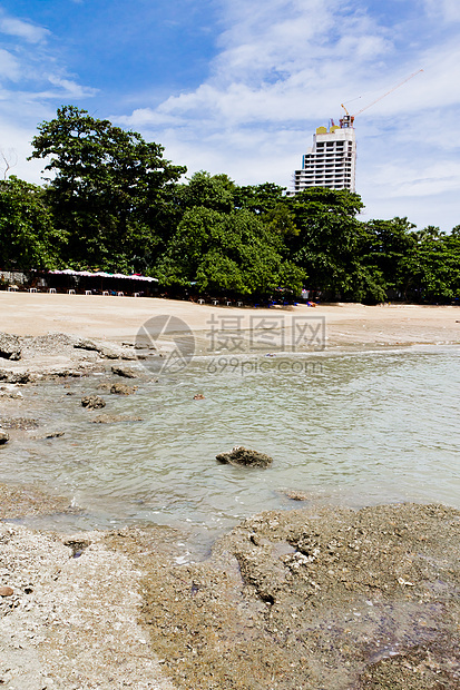 海滩 岩石地区和海洋日落海浪阳光正方形荒野热带太阳旅行野生动物日出图片