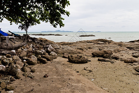 海滩 岩石地区和海洋阳光热带野生动物日出地平线天空日落荒野石头海景图片