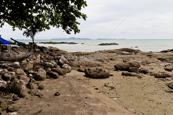 海滩 岩石地区和海洋阳光热带野生动物日出地平线天空日落荒野石头海景图片