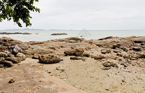 海滩 岩石地区和海洋蓝色运动旅行热带太阳正方形日出海浪场景阳光图片