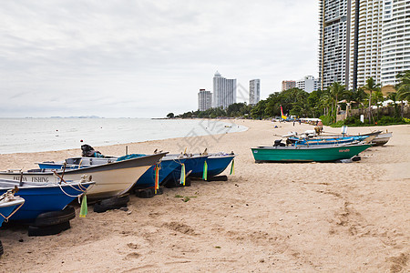 小型渔船场景渔夫港口旅行支撑太阳地球发动机钓鱼海滩图片