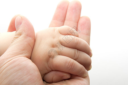 父亲和婴儿的手手势压痛雏鸟脚趾新生儿孩子白色父母手指新生图片