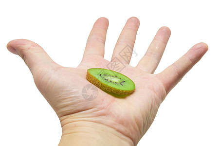 一只手握着白色背景的kiwi反射蔬菜食物绿色奇异果香气水果男人皮肤手指图片