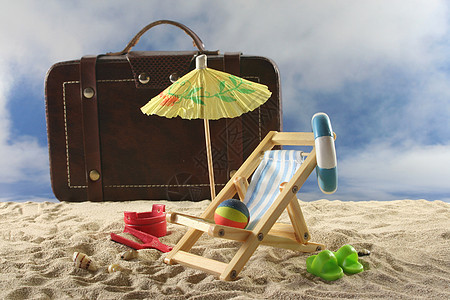 度假旅行太阳太阳椅水球谎言手提箱娱乐木椅闲暇椅子休息图片