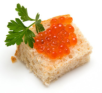 面包上红鱼子酱和卷饼熟食盐渍奶油红色文化宏观黄油香菜叶子早餐图片