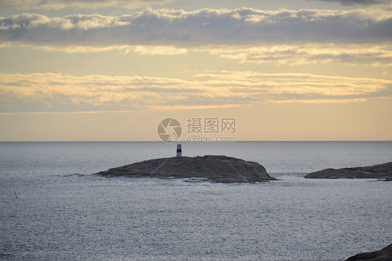 灰石棉保护区花岗岩日落波浪岩石灯塔图片