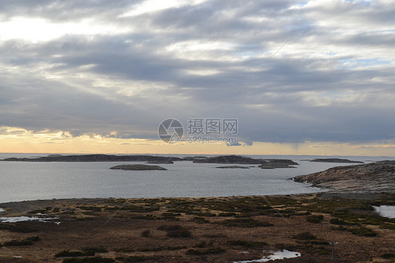 灰石棉岩石灯塔波浪日落保护区花岗岩图片