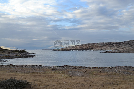 灰石棉保护区日落花岗岩灯塔波浪岩石图片