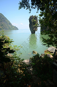 债券岛海滩石灰石拍摄蓝色树叶旅行旅游天空纪念品天堂图片