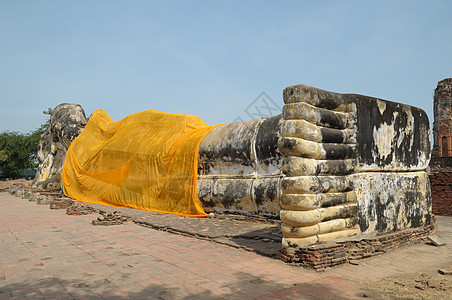 睡觉的布泽寺庙金子雕像信仰崇敬微笑佛教徒蓝色休息宗教图片