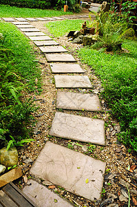 花园中的石头路人行道美化草地绿化园林沉思绿色概念脚步公园图片