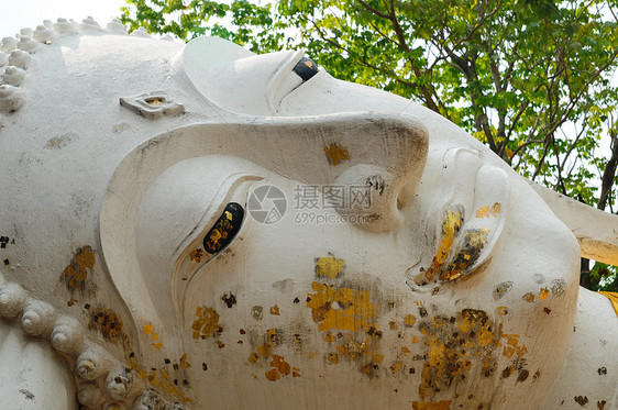 脸朝布德达的面部金子冥想青铜寺庙雕塑微笑天空信仰雕像佛教徒图片