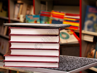 由电子图书阅读器组成的丰富多彩书籍堆放展示教育教科书学习数字化读者阅读图书文学技术图片