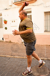 Pelota 播放器玩家运动街道男性传统鹅卵石游戏行动村庄服务运动员图片