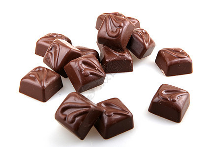 白色背景的堆叠巧克力糖果Name免版税食物原料甜点照片酒吧股票图片刨花烘焙图片