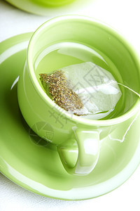 绿茶陶器器皿茶碗瓷器茶包绿色工作室厨具杯子饮食背景图片