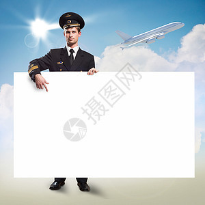 以持有空广告牌的形式进行试点帽子蓝色侦察员销售喷射领导者木板邮政男人航空图片