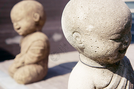 两石和尚柚木力量文化偶像精神佛教徒冥想雕塑塑像雕像图片