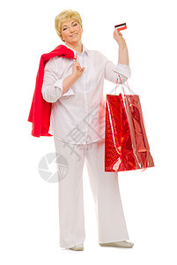 带袋袋和信用卡的高级妇女喜悦金融女士微笑退休衣服成人快乐卡片顾客图片