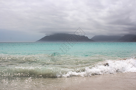 Kommetjie海滩 背景中即将发生暴风雨交界处乌云海洋旅行场景雷雨海景天堂支撑气候图片