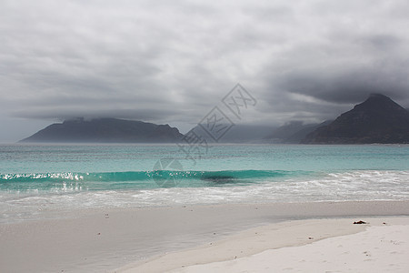 Kommetjie海滩 背景中即将发生暴风雨假期乌云热带天气雷雨场景戏剧性海岸蓝色天堂图片