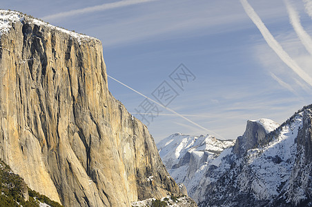 Yosemite河谷花岗岩峰的太阳升起树木名声公园辉光国家花岗岩岩石日落圆顶日出图片