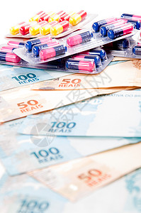 药丸 胶囊和巴西货币止痛药包装资金宏观科学疾病用品治愈药品商业图片