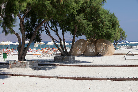 科斯岛马斯蒂沙里海滩场景海岸风帆遮阳伞假期乳香雨伞酒馆冲浪晒黑图片