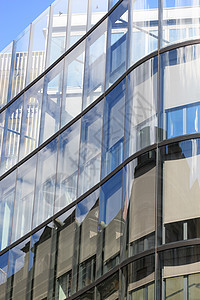 现代建筑反射插图公司市中心技术窗户生长天空玻璃商业图片
