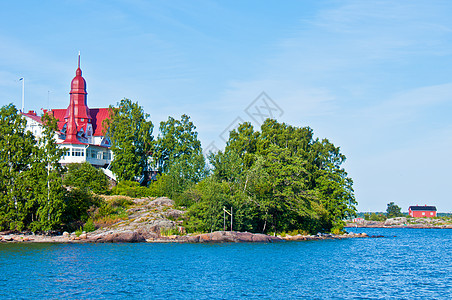 赫尔辛基海景绿色红色海岸支撑岩石图片