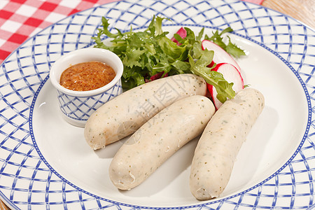 德国香肠美食萝卜油炸食物餐厅平底锅盘子沙拉香菜蔬菜图片